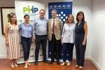 Foto de familia durante el convenio