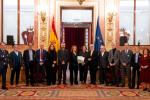 Foto de familia con los participantes en la jornada celebrada en el Congreso de los Diputados