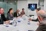 Un instante de la reunión mantenida por representantes de la PMP en la sede del PP