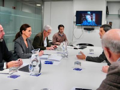 Un instante de la reunión mantenida por representantes de la PMP en la sede del PP
