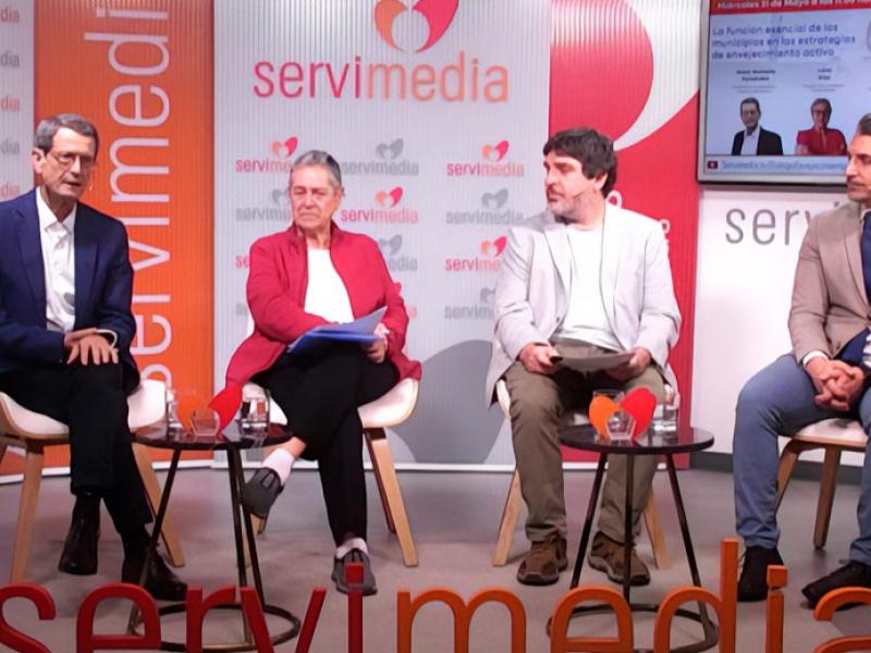 Los participantes en el diálogo de Servimedia